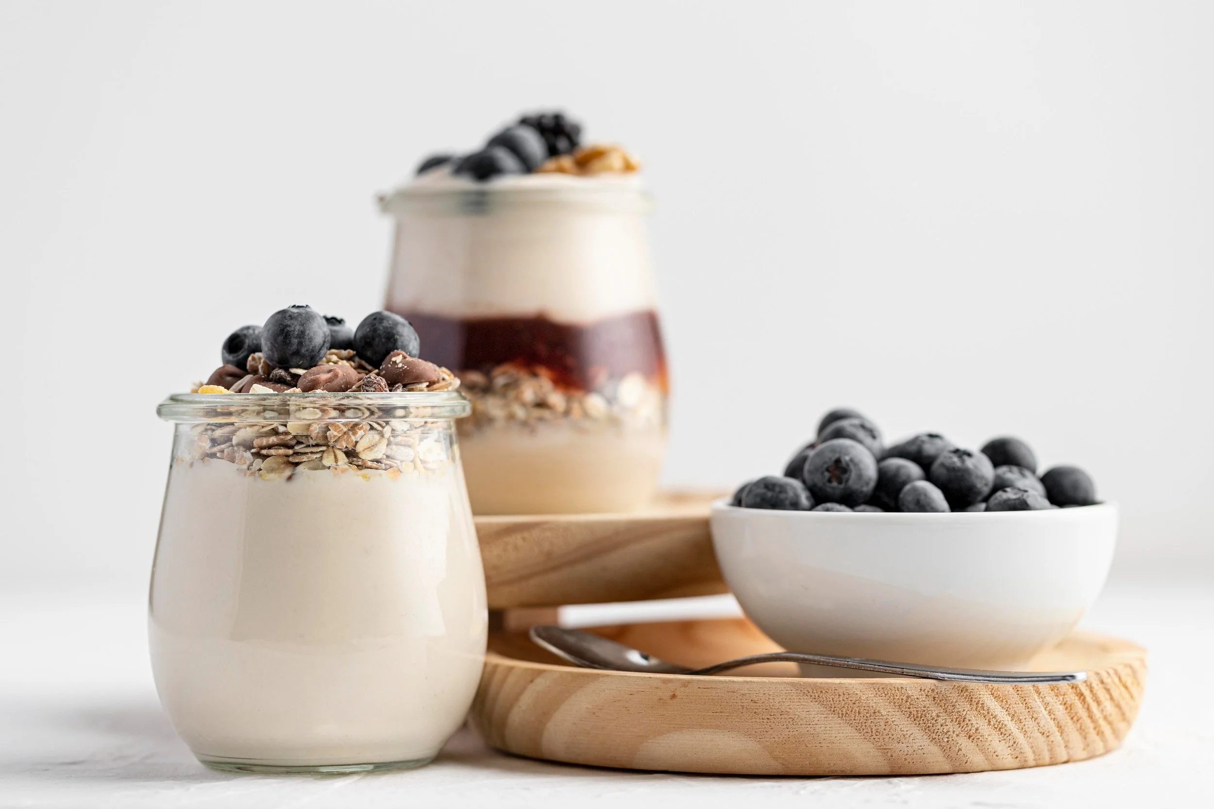 Yogurt topped with berries as a healthier snack alternative